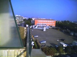 image from my hotel window with a view of the stage in the car park next door you can not see the loud music