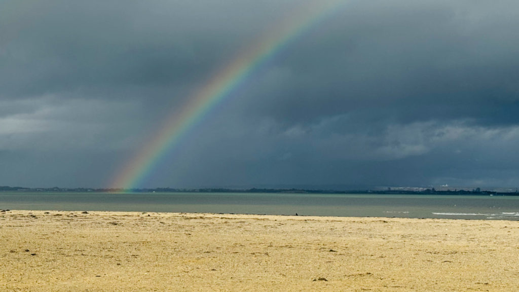Rainbows over Ryde beach