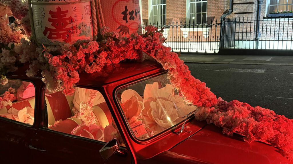 A decorated car outside KOYN Japanese: a celebration of the artistry of Japanese cuisine 