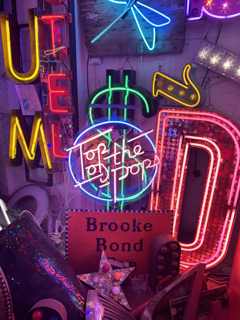 A neon Top Of The Pops sign at God's Own Junkyard - a museum dedicated to neon signs.