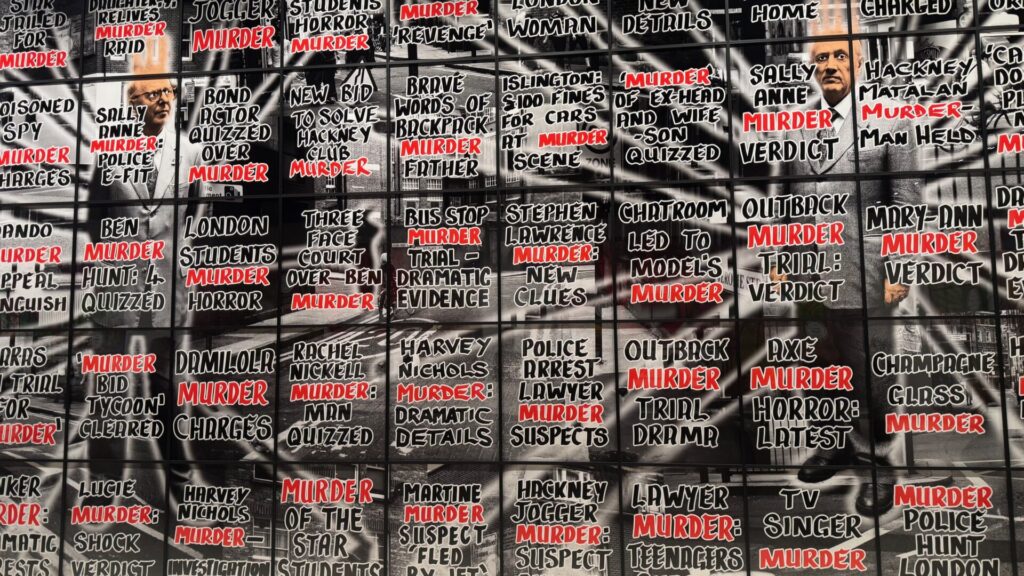 A large-scale photographic artwork composed of a grid of panels showing repeated newspaper headline posters. The word 'MURDER' appears prominently in red capital letters throughout multiple panels against a black and white background. The headlines reference various crimes and incidents including student murders, jogger attacks, and police investigations. Two suited male figures appear in the central panels of the grid composition.