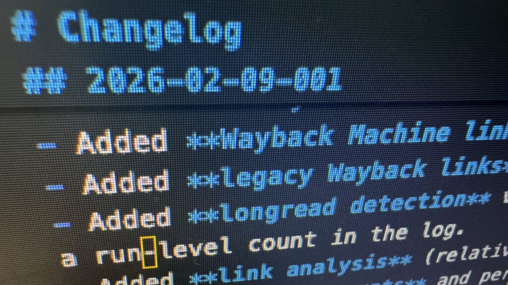 Changelog displayed on a computer screen showing entries with added functionality for Wayback machine time, Legacy Wayback links, and Longread detection, along with a run-level count in the log.